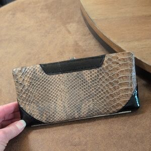 Chic Snakeskin and Black Leather Clutch